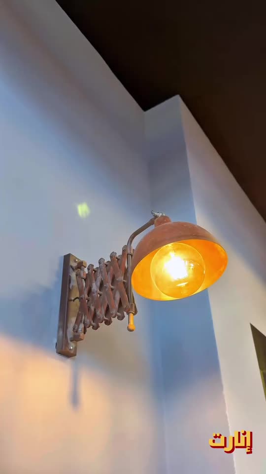 Lighting and stone cladding at Adalia Café